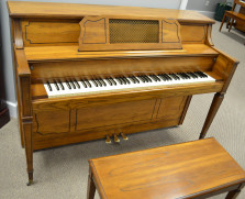 Everett pecan console piano